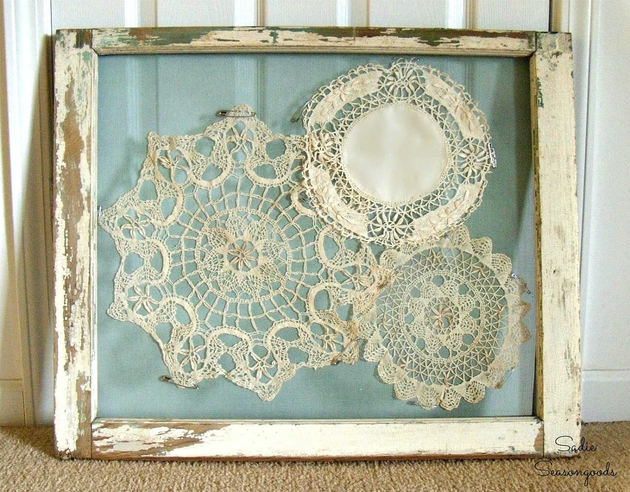 Displaying the vintage doilies with old window frame decorating ideas