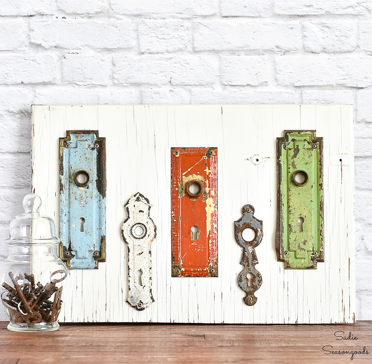 Keyhole Covers Or Vintage Hardware As Entryway Wall Decor For The