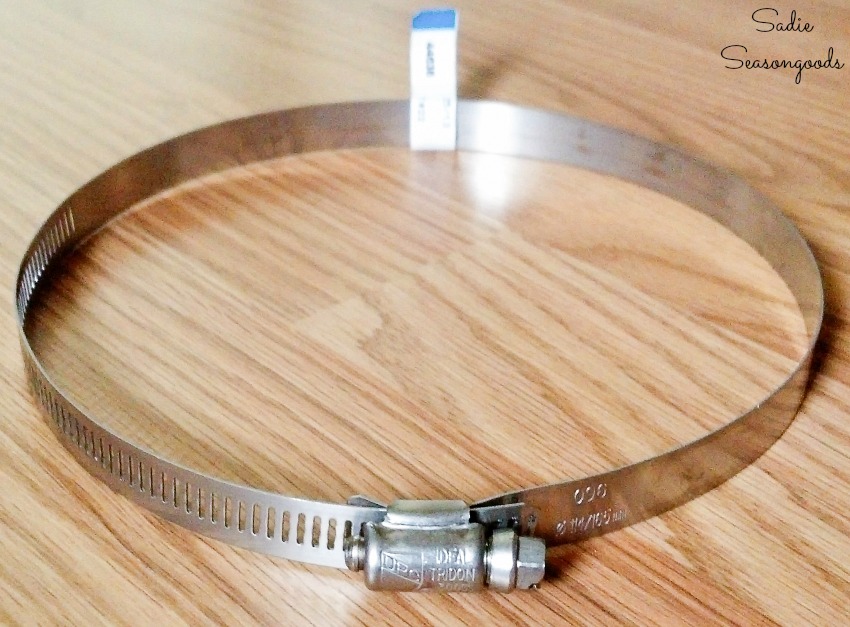 Stainless steel hose clamp to fill with wine corks as a kitchen trivet