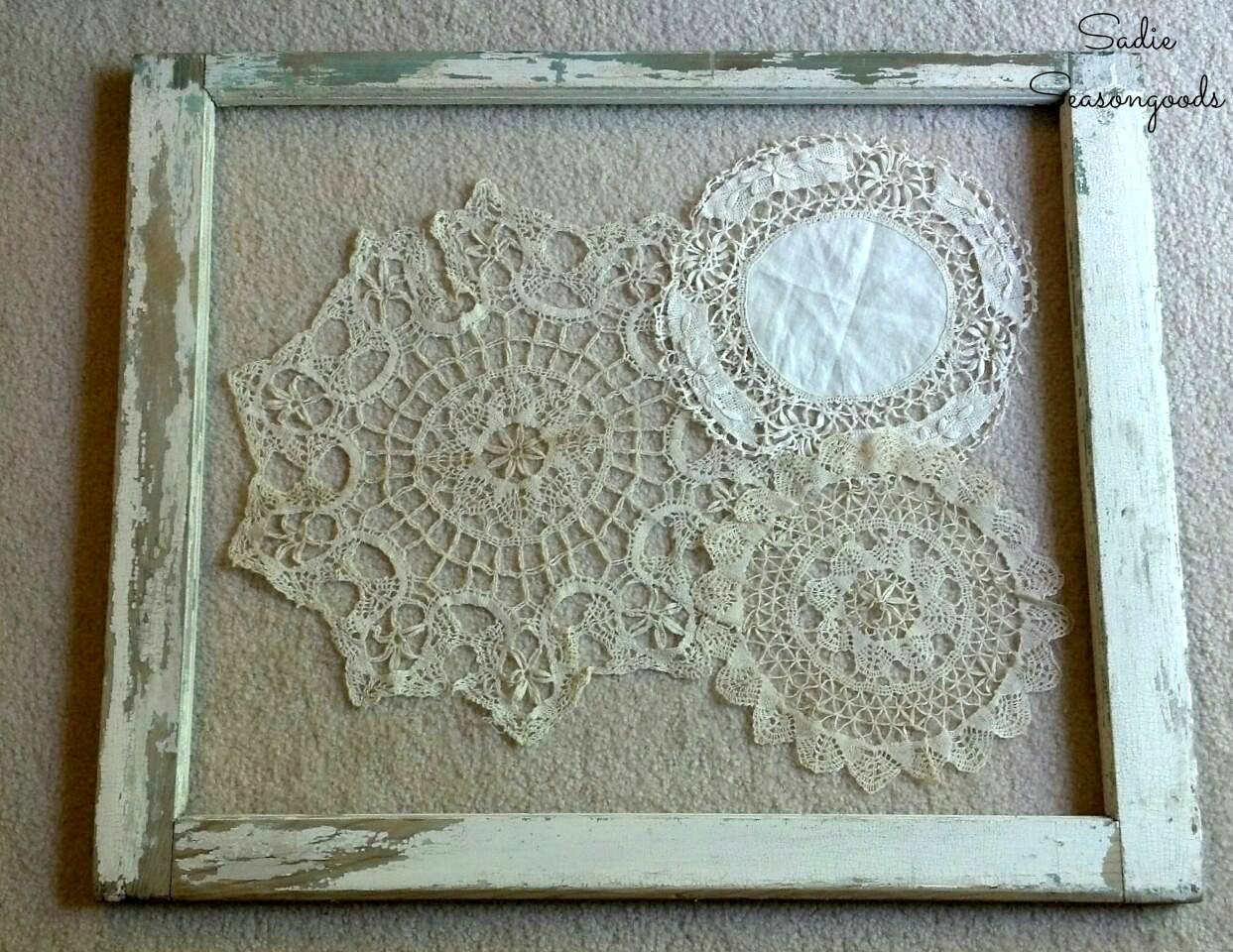 Window frame decor with vintage doilies as shabby chic wall art