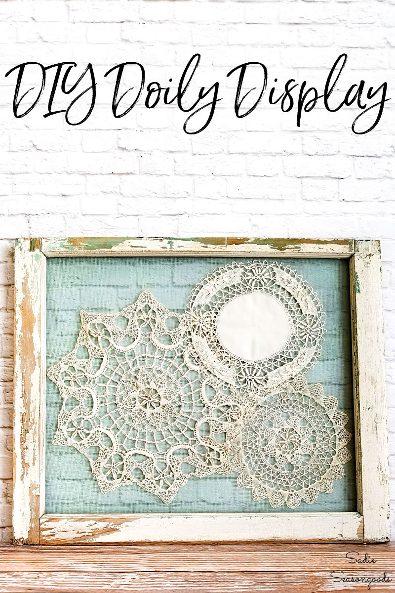 Framed doilies in a vintage window frame