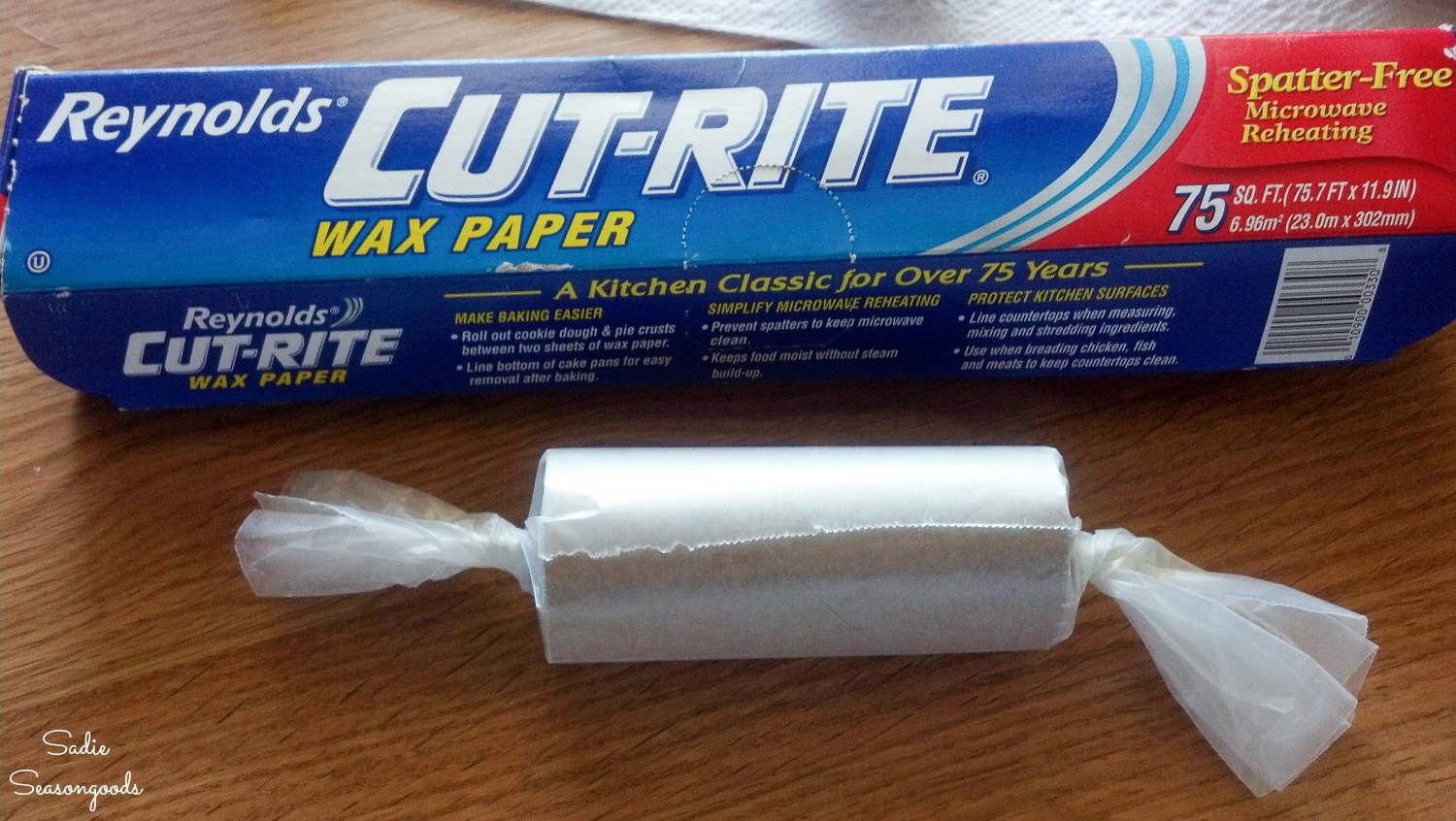 Wrapping a lint fire starter with wax paper for emergency prepping