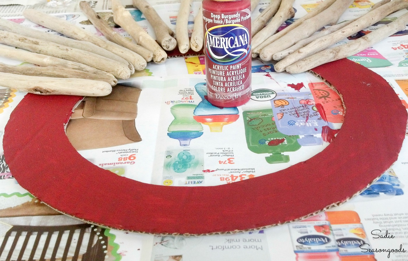 Painting a cardboard wreath form to match the front door