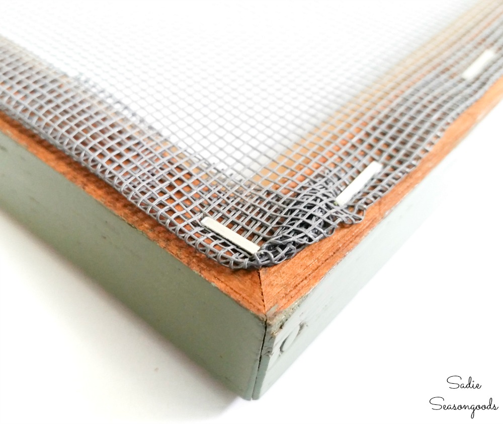 Attaching a window screen to a wooden picture frame