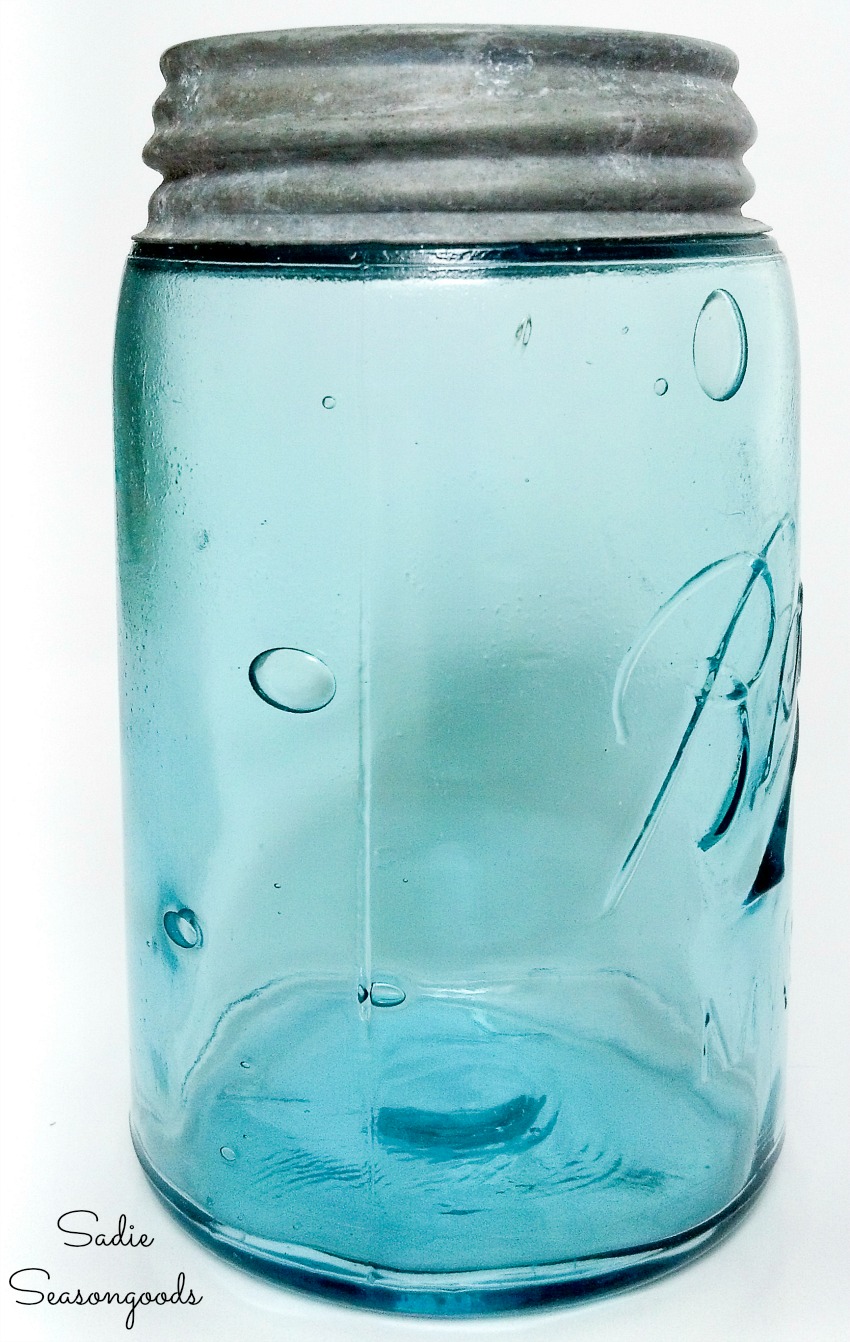 Blue ball mason jar with glass bubbles