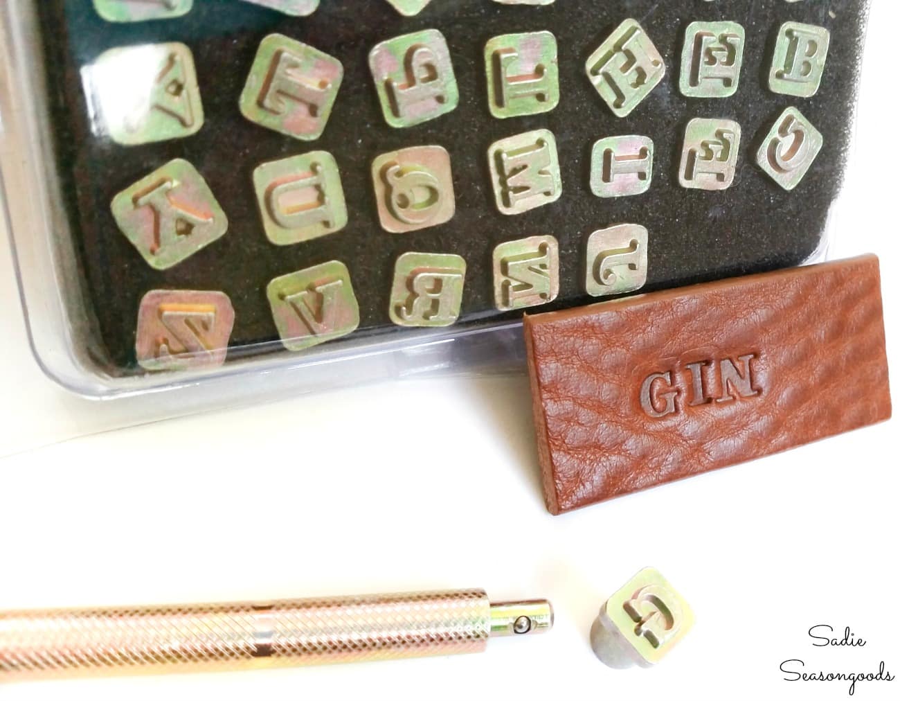 Leather stamping tools on belts from the thrift store