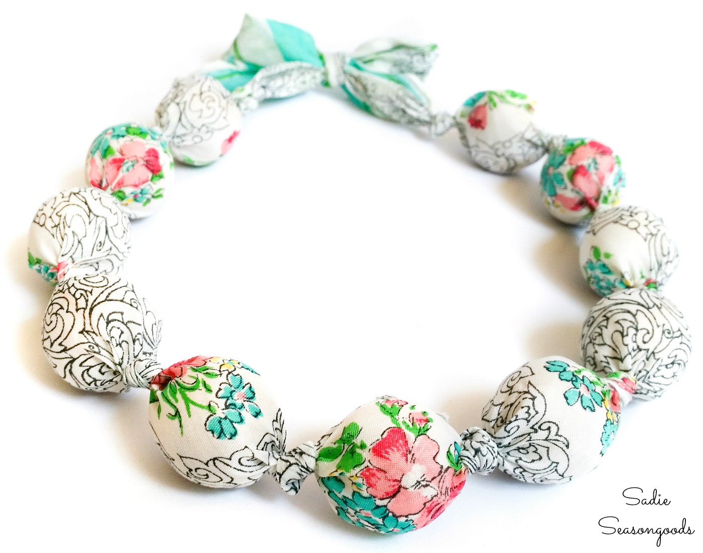 Repurposing a vintage scarf as a scarf necklace