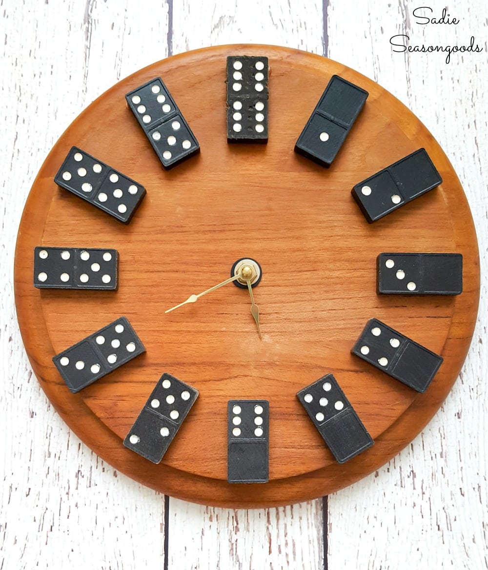 Upcycling a round cheese board and vintage dominoes for playroom wall decor