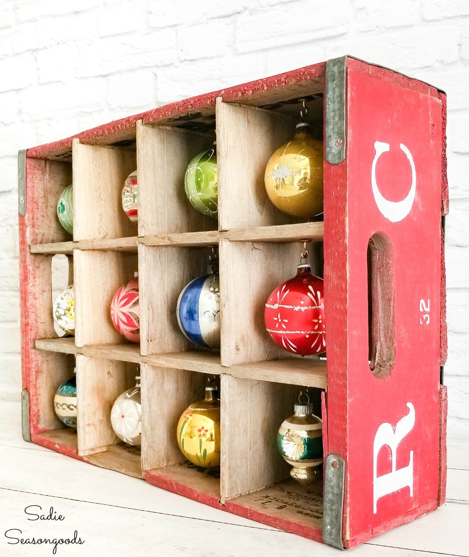 Upcycling a soda crate to display Shiny Brite ornaments