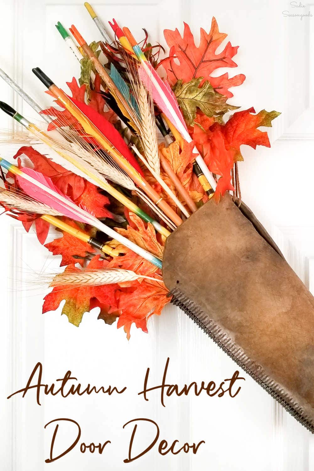 autumn wreath with wooden arrows