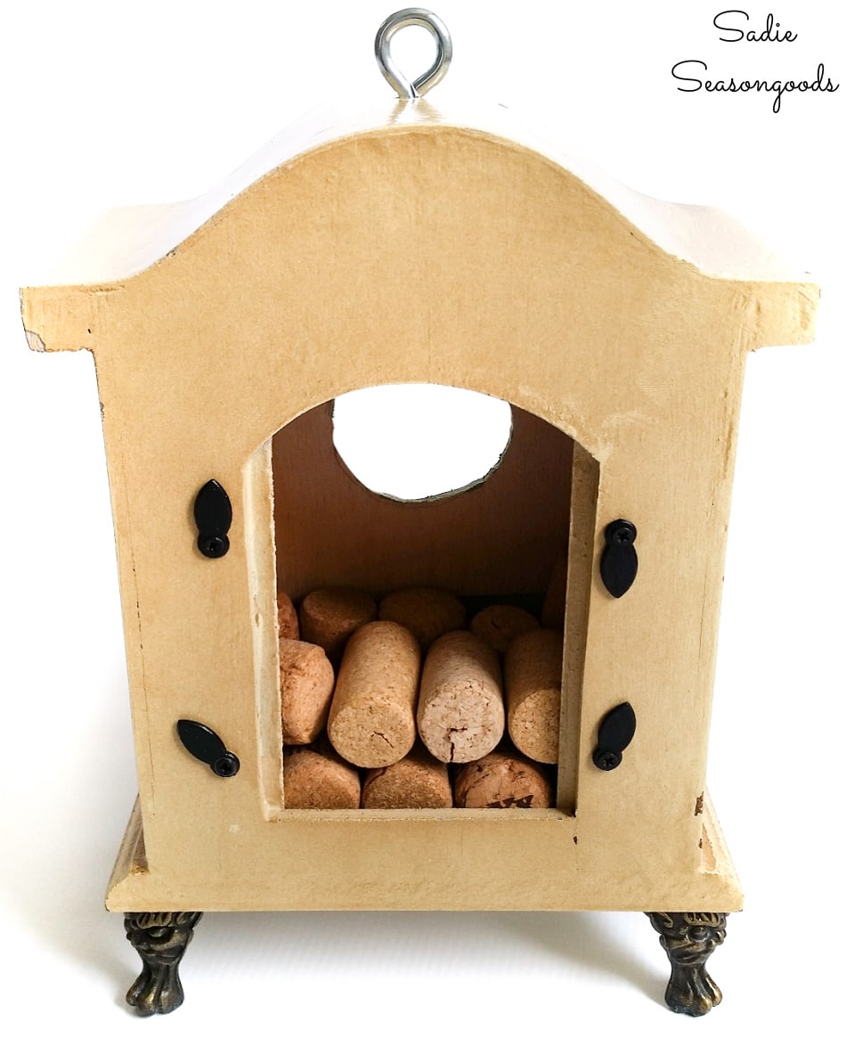 Wine corks inside an upcycled birdhouse