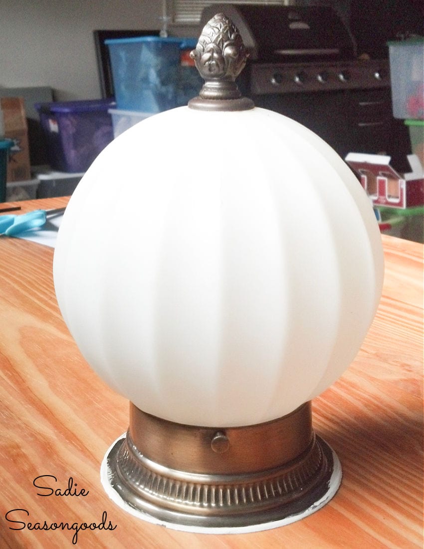 glass globe light fixture with finial