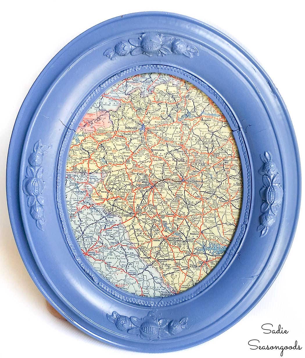 vintage road map in an antique oval frame