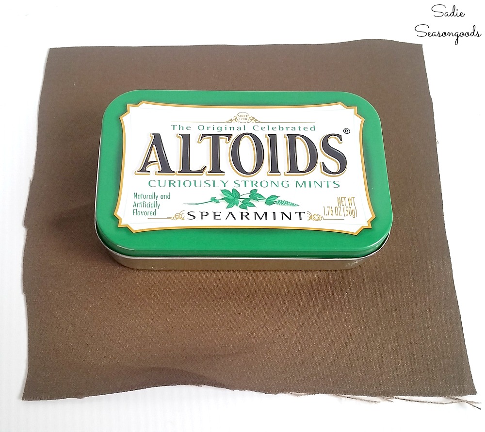 Covering an Altoids tin in fabric to make it look like the vintage luggage as a Christmas ornament