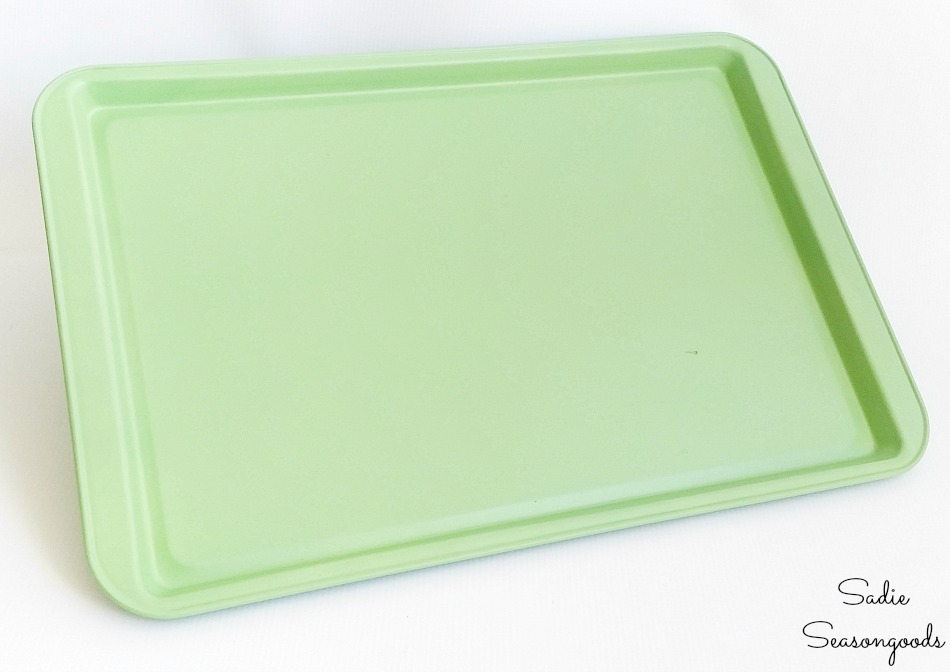 Spray painting metal of a cookie sheet as a magnet display board