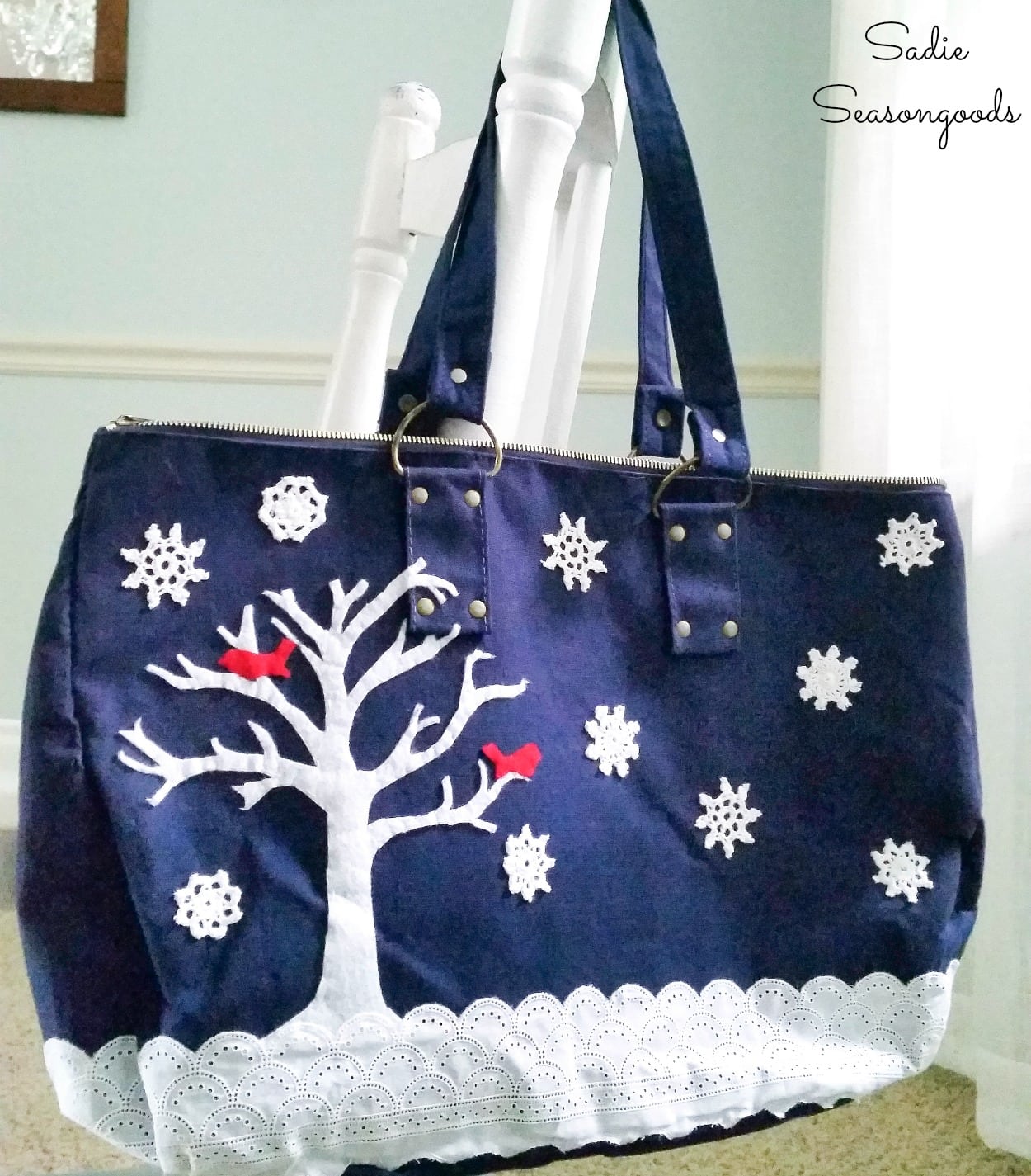 Decorating a tote bag with a snowy scene