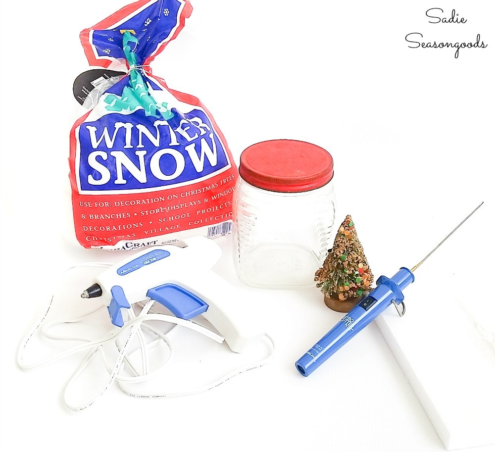 Craft supplies for a DIY waterless snow globe