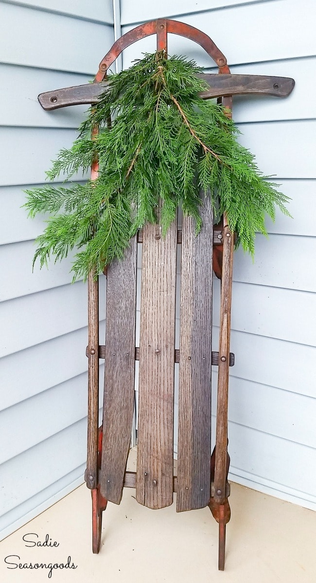 Decorating a vintage sled for porch decor