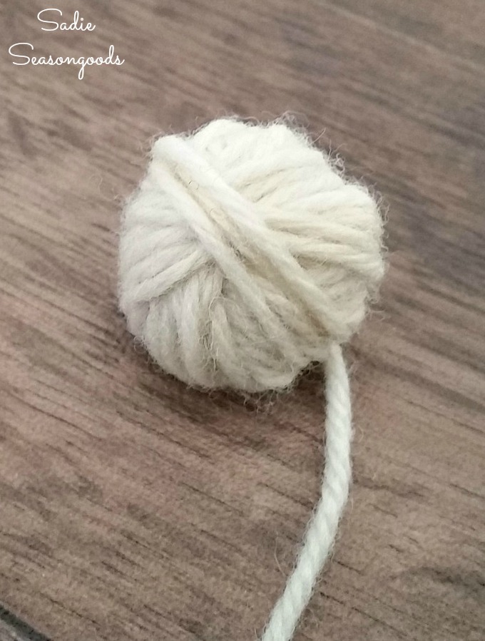 Winding wool yarn in a ball to create tumble dryer balls for Earth Friendly products in the laundry by Sadie Seasongoods