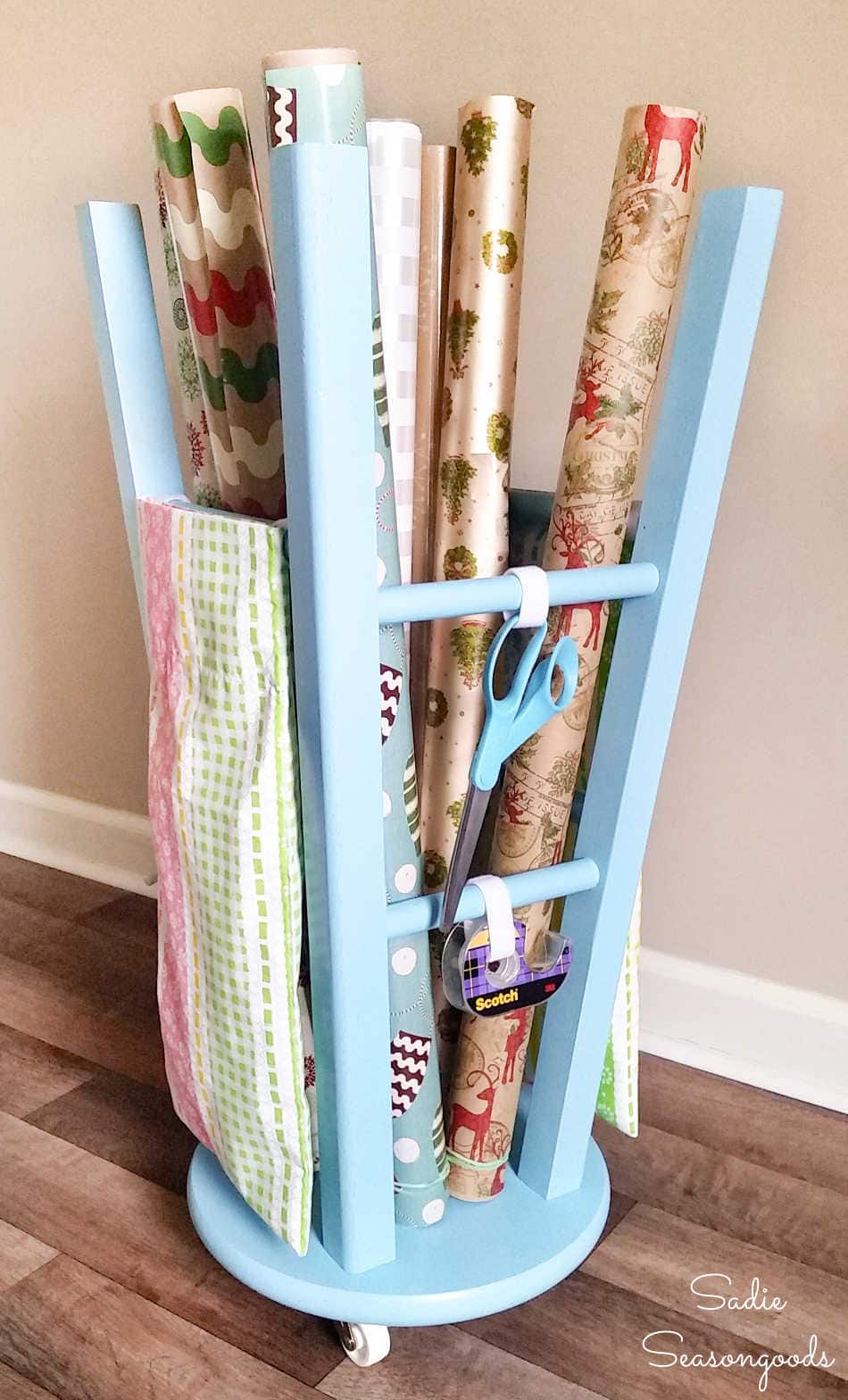 wood counter stool as vertical wrapping paper storage