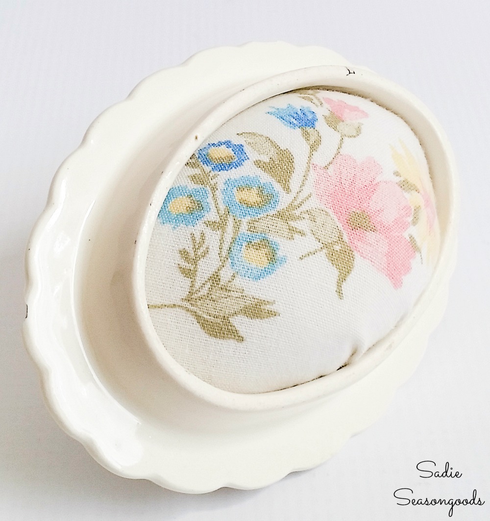 Adding a needle cushion for sewing supplies in the lid of a vintage teapot