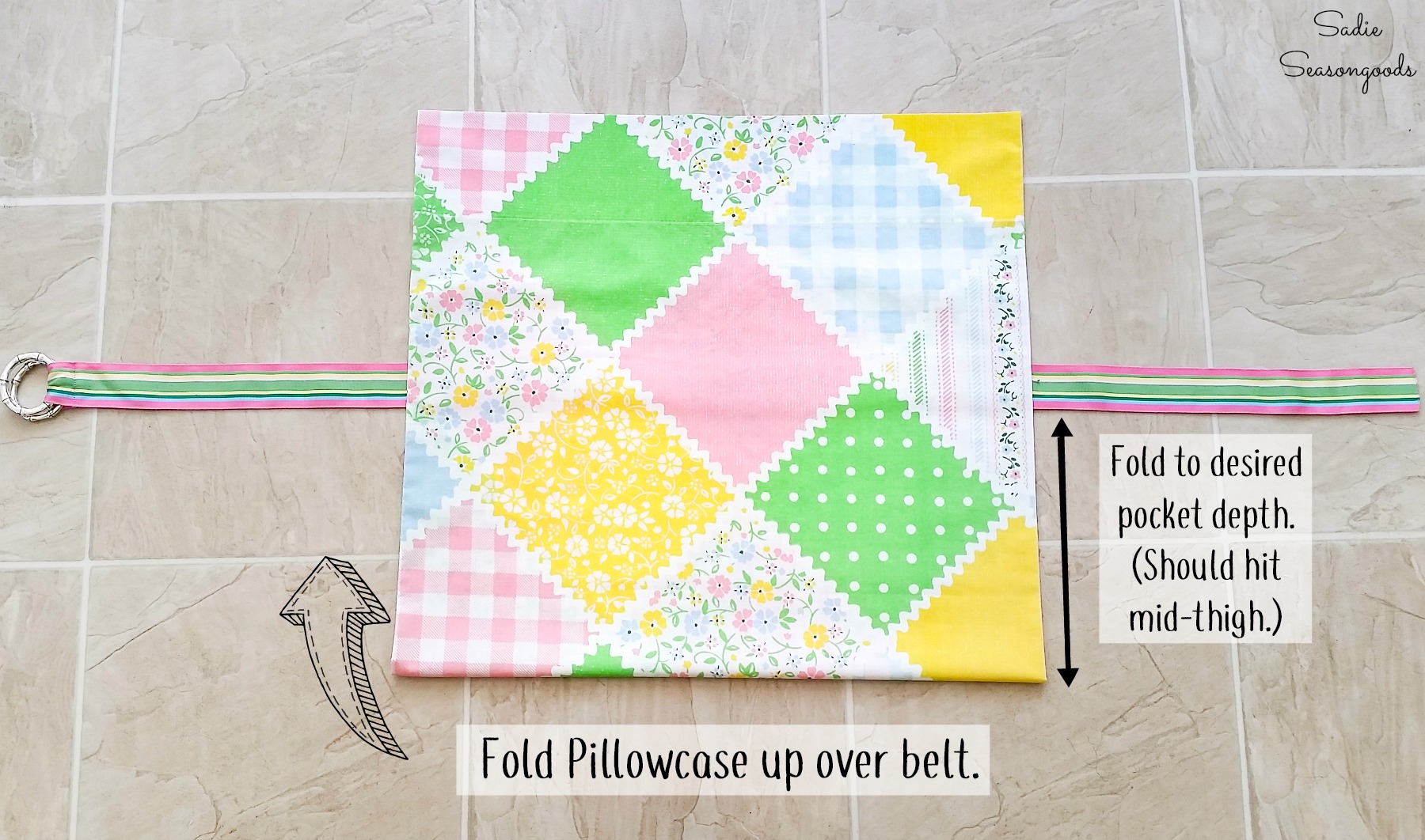 Folding a vintage pillow case to make a half apron with a fabric belt