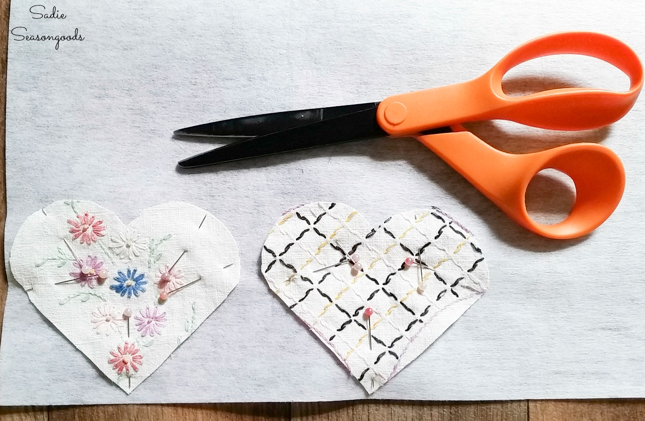 Pinning the embroidered linens to firm interfacing