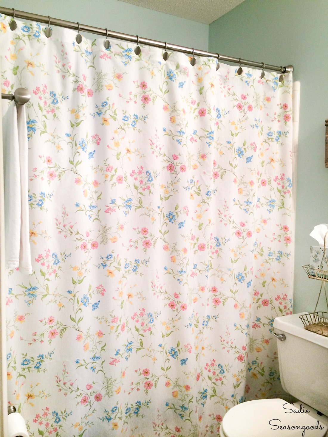 Floral shower curtain for a cottage style bathroom from vintage bed sheets