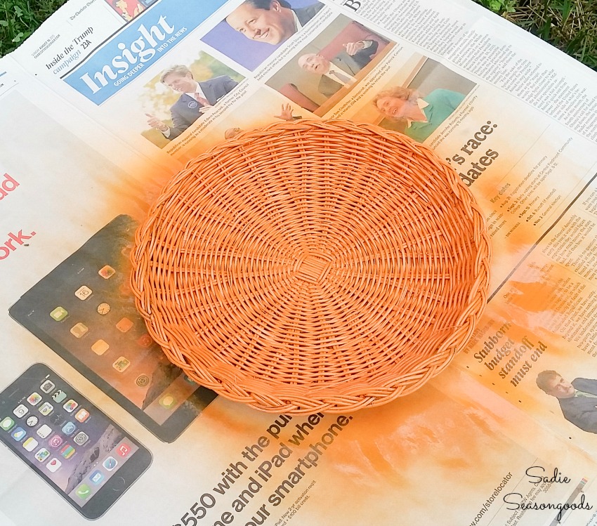 Making a jack o lantern with a wicker paper plate holder