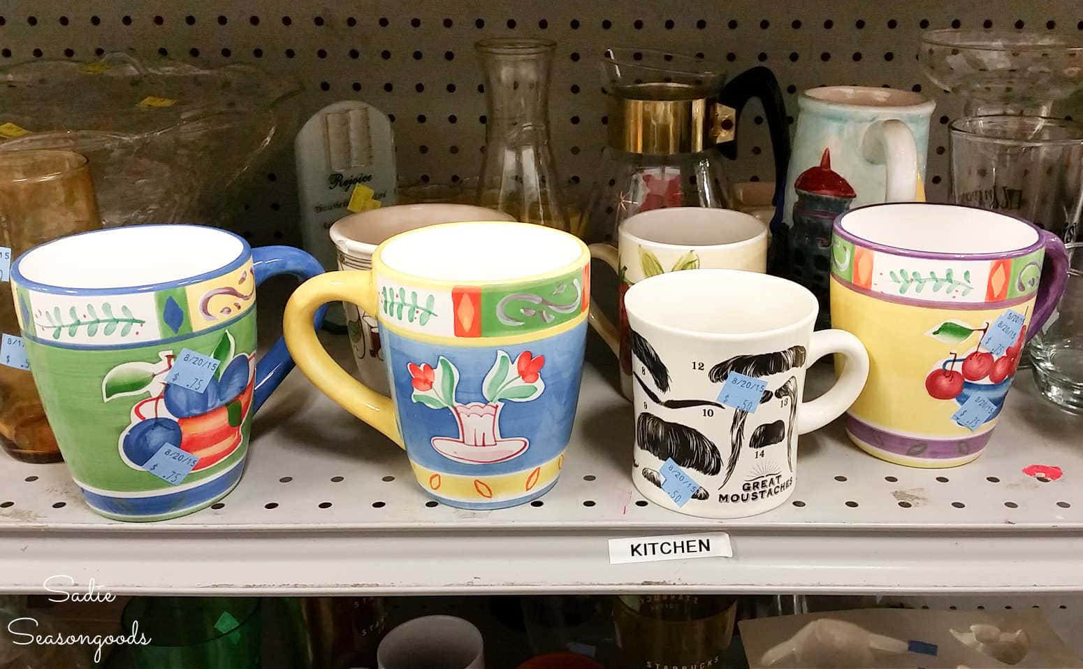 mugs on a thrift store shelf