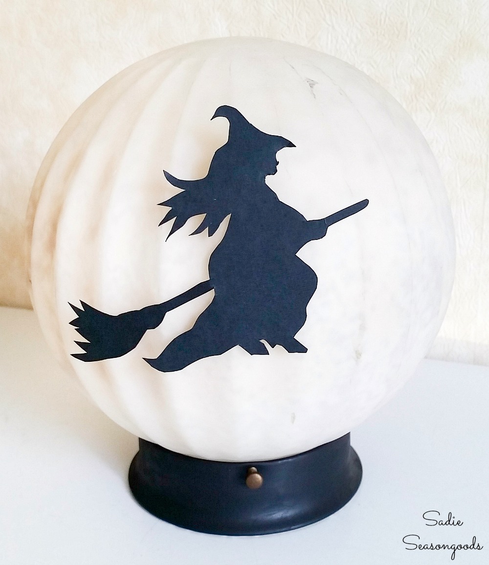 Witch decor on a light up moon