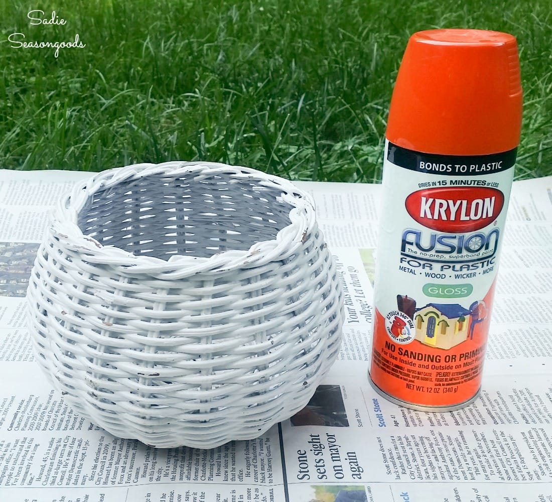 Making a pumpkin basket with orange spray paint