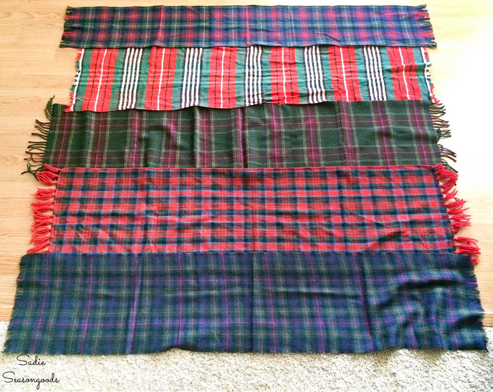 Laying out the tartan scarves