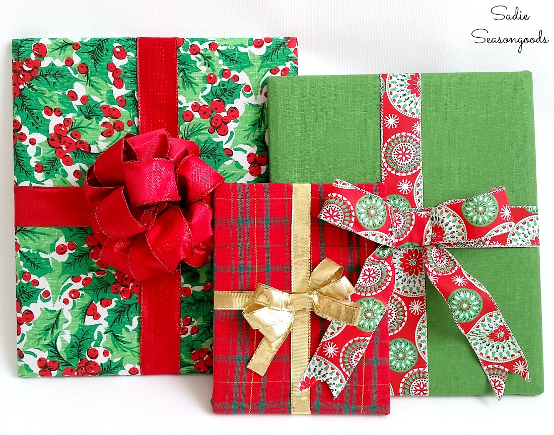 Cheap Christmas decorations by upcycling the wooden frames and Christmas placemats into wrapped gifts by Sadie Seasongoods