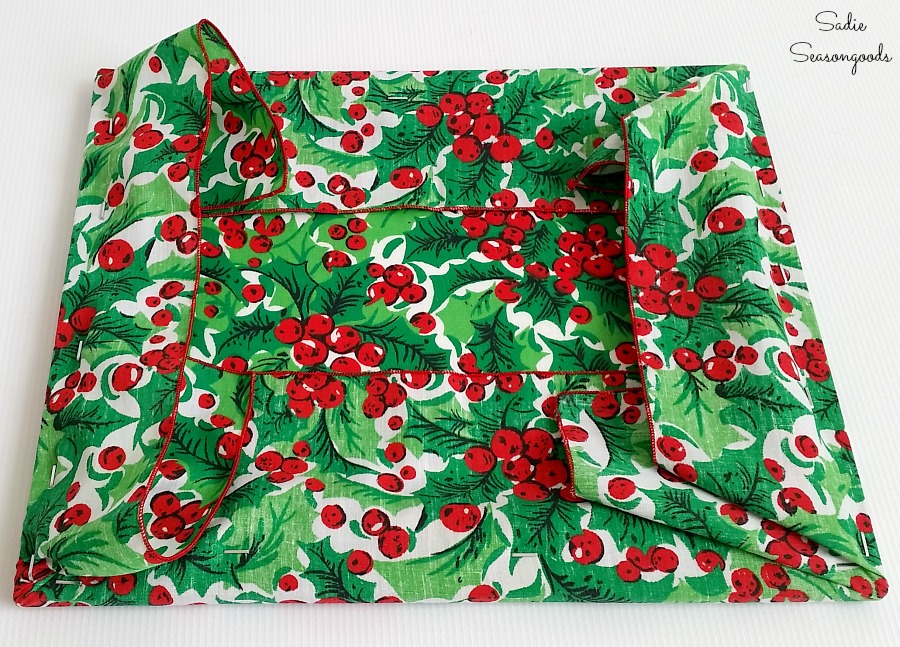 Upcycling the wooden picture frames into Christmas decorations that look like wrapped gifts by Sadie Seasongoods