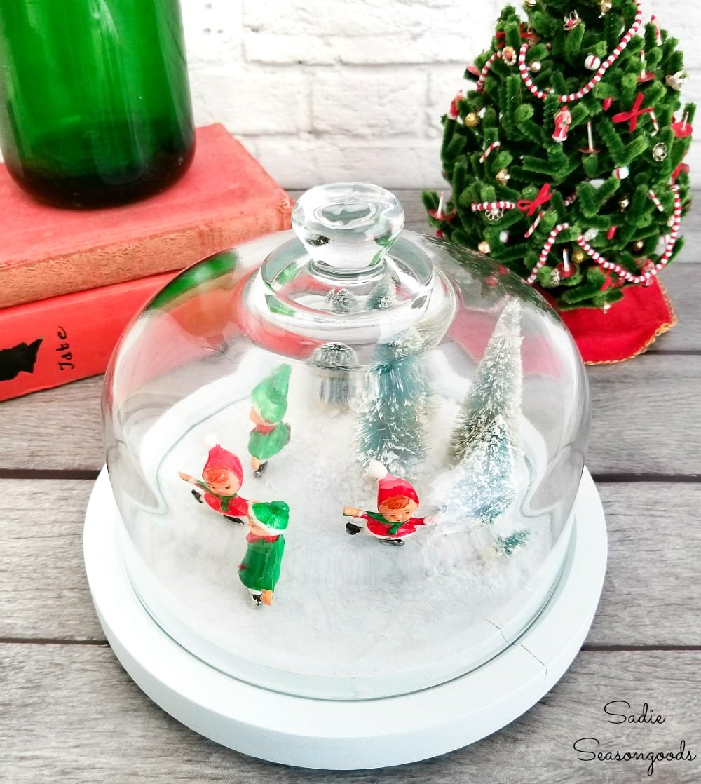 Glass cheese dome with Christmas winter scene