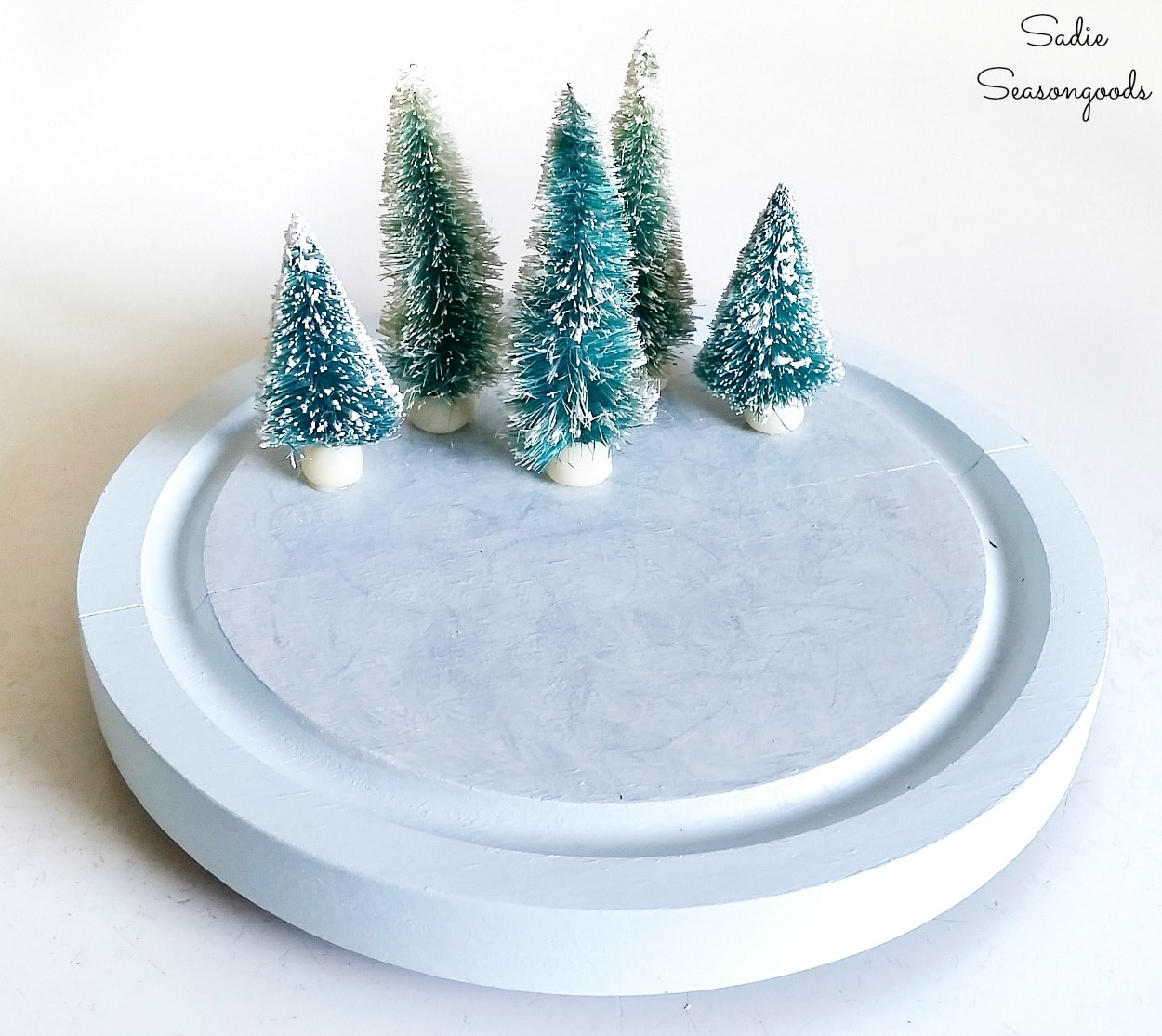 Vintage bottle brush trees for a winter Christmas scene