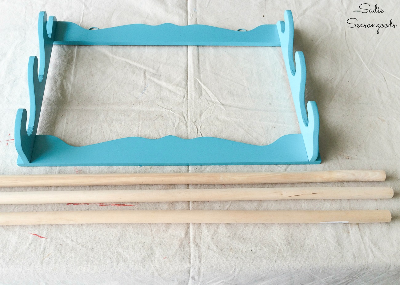 Wooden dowels to go in a hanging gun rack for scrap fabric