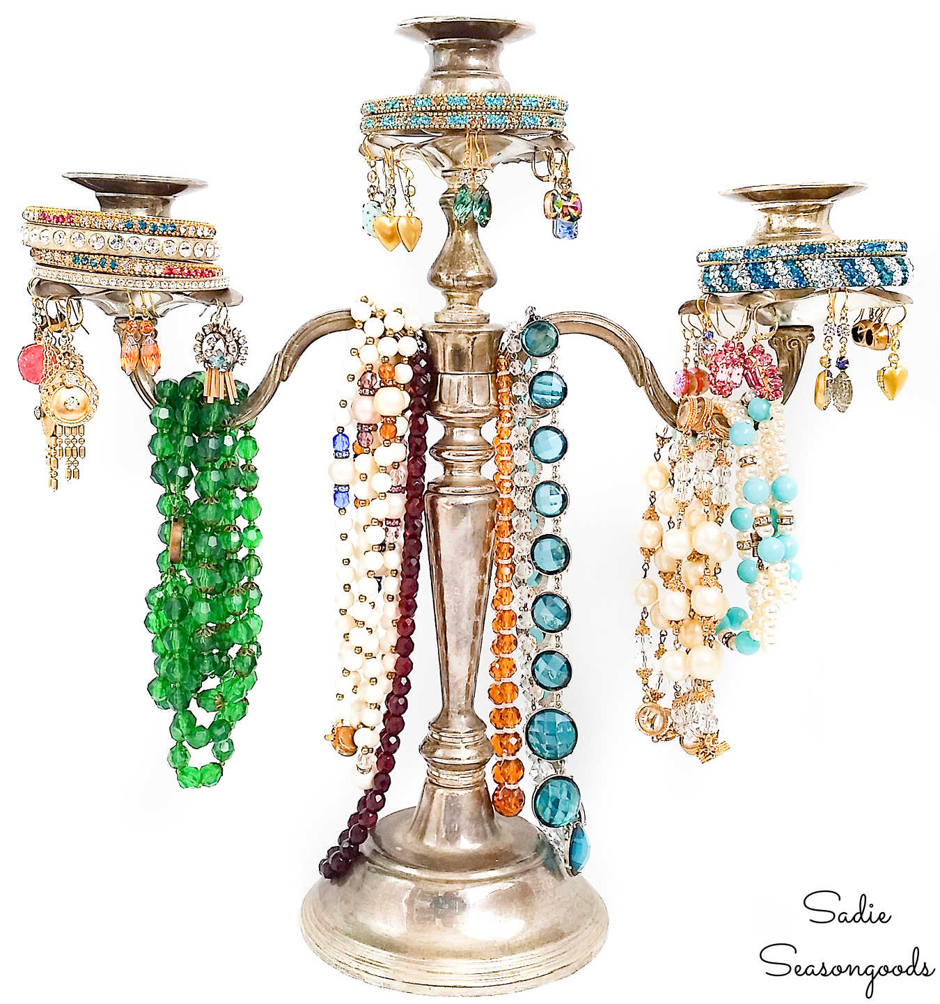 silver candelabra as a jewelry tree stand