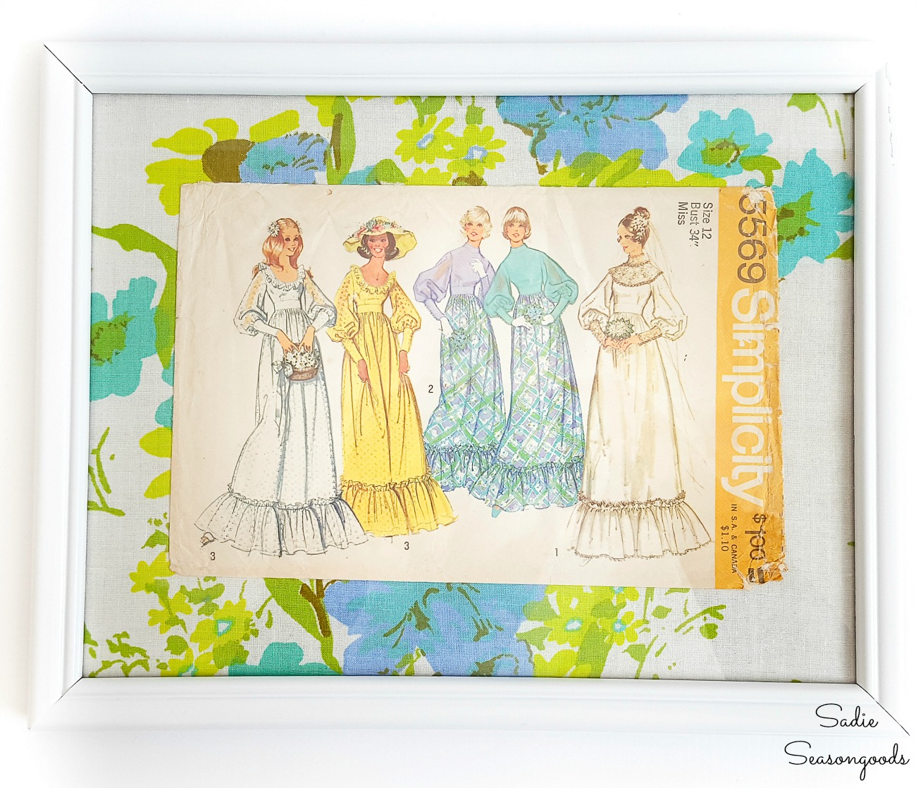 Sewing room decor by framing the vintage dress patterns