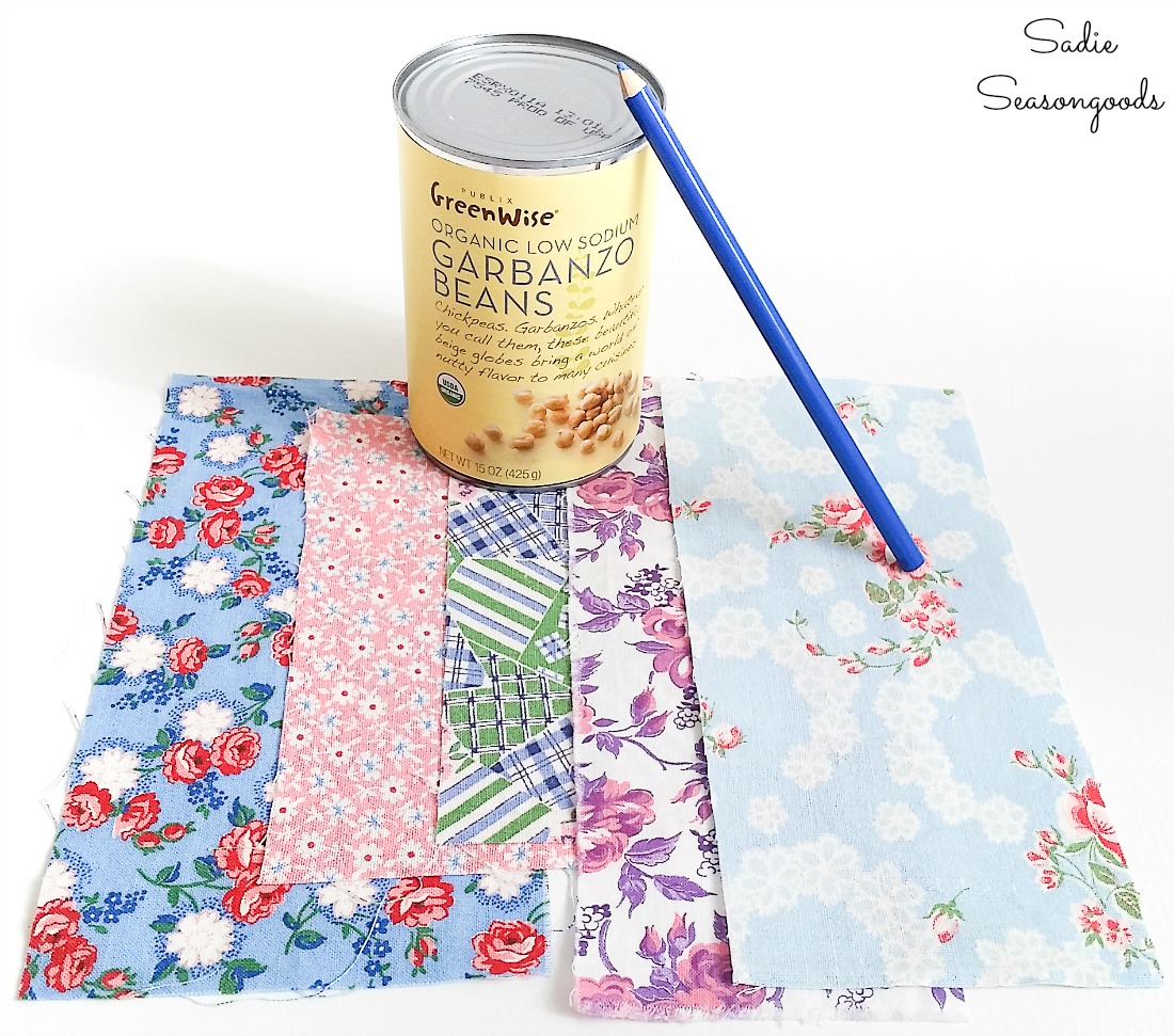 Using a tin can to trace circles on flour sack cloth Using a tin can to trace circles on flour sack cloth