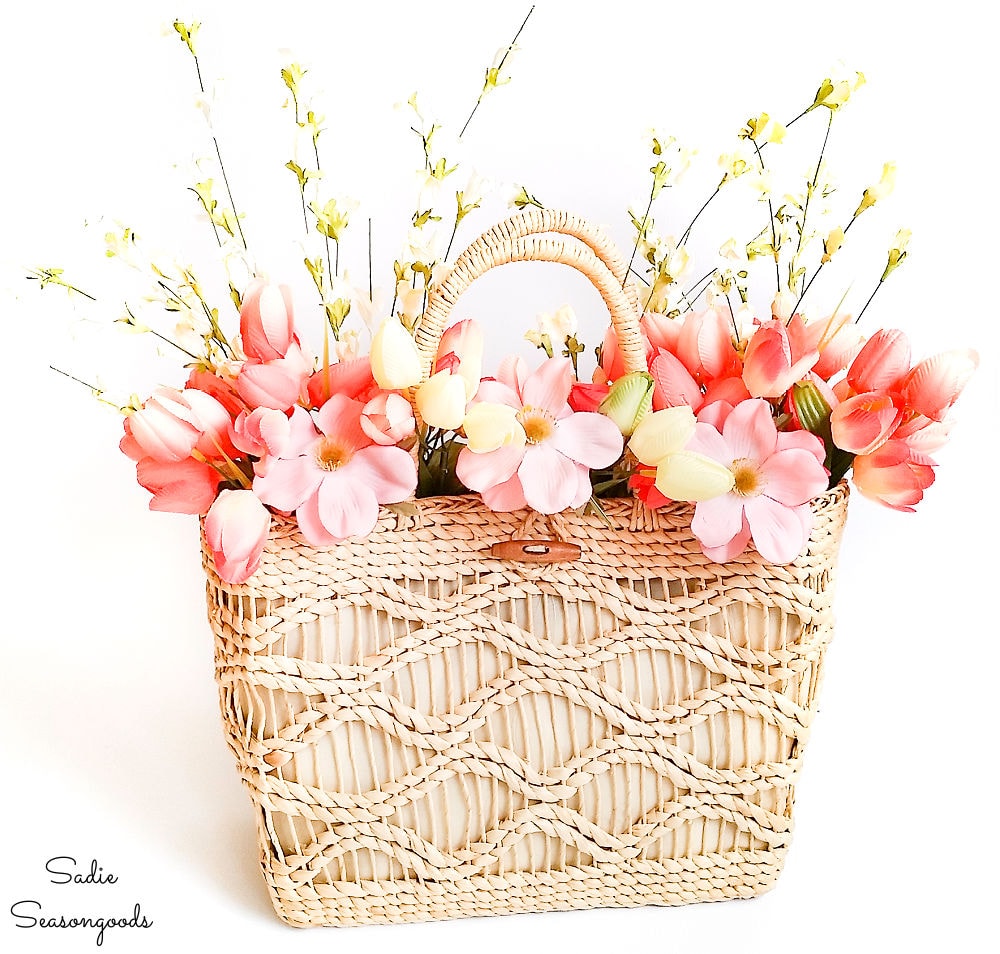 Straw tote as spring floral wreath