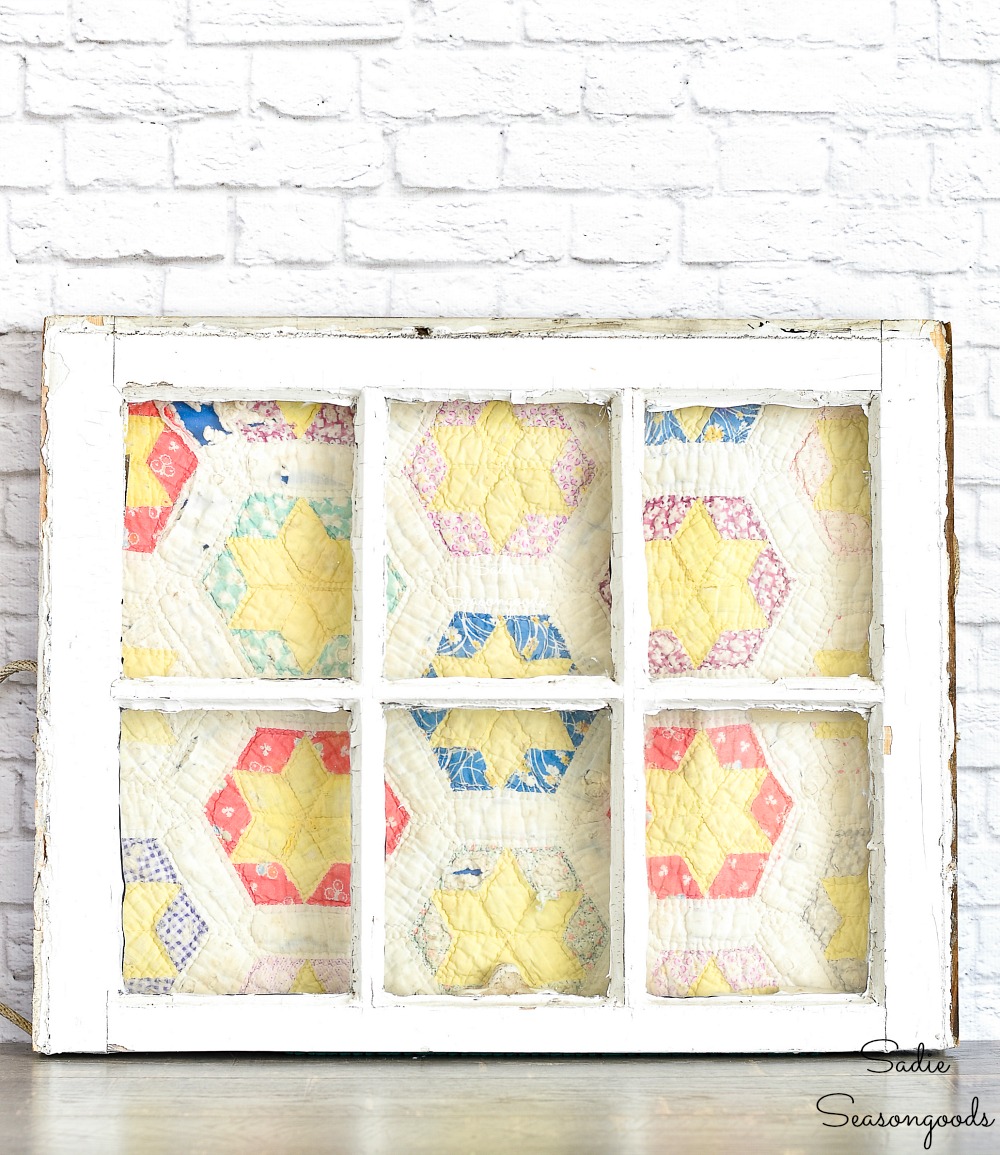 Upcycling a vintage window as a quilt frame for primitive decor