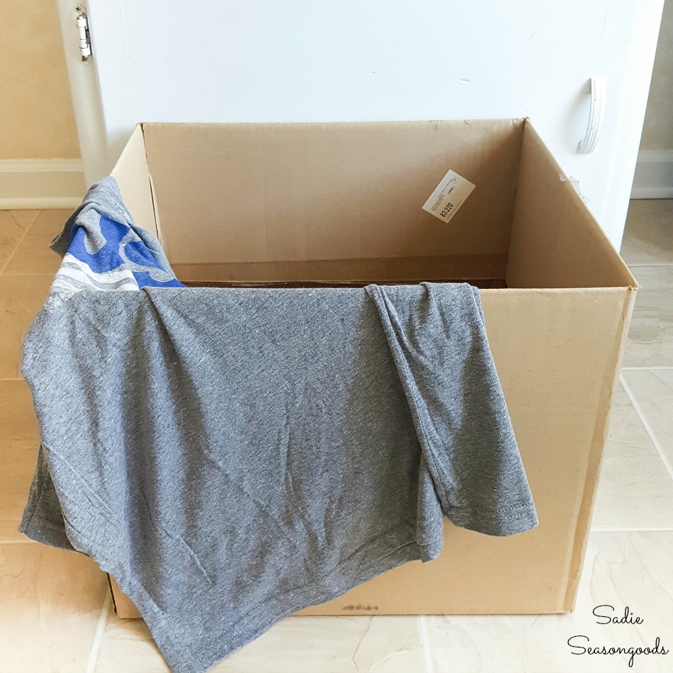 Pet tent with a cardboard box and recycled t shirt
