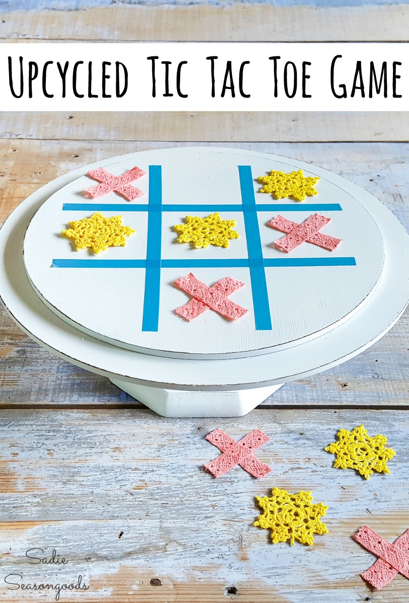 Wooden cake stand and small doilies as a tic tac toe game