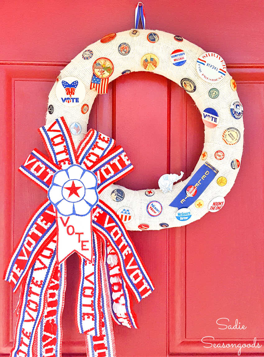 vintage campaign buttons on a red white and blue wreath