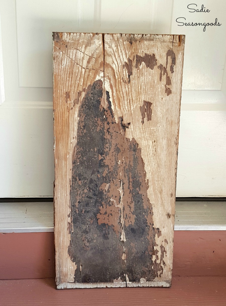 Salvaged wood to be used for displaying hex signs on tool shed for outdoor wall decor by Sadie Seasongoods