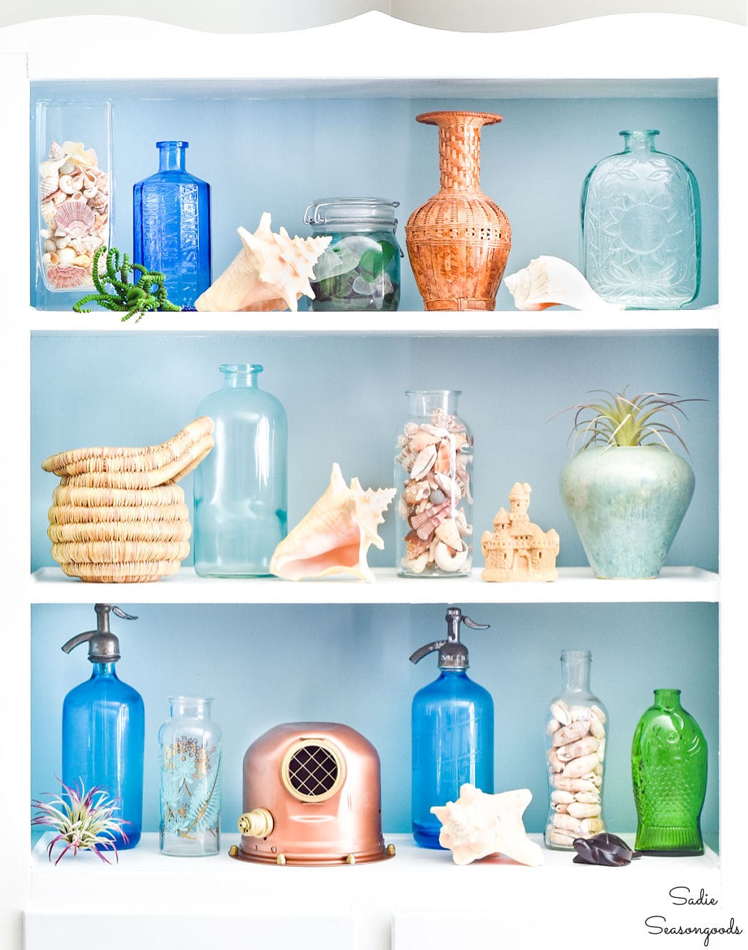 https://www.sadieseasongoods.com/wp-content/uploads/2016/07/styling-shelves-for-coastal-decor.jpg