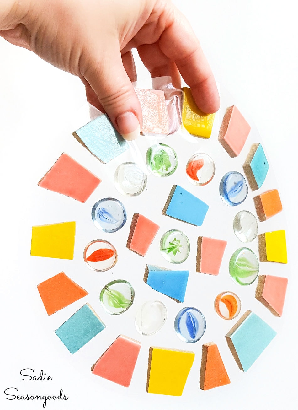 Tile and glass gems for a DIY mosaic stepping stone