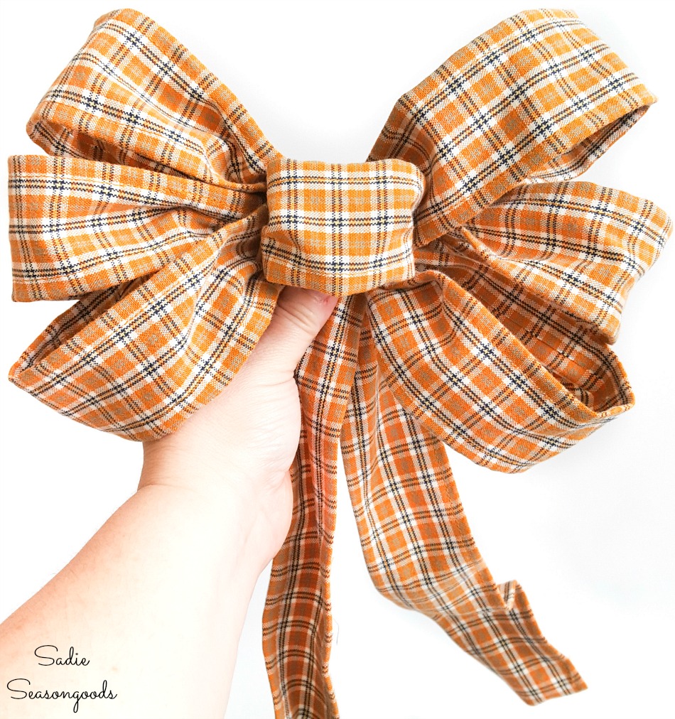 Making a bow with plaid ribbon